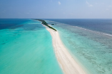 stunning blue ocean and sandy lux hotels on water top drone aeral view Maldives beach copyspace for...