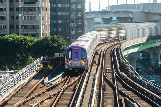 Taoyuan, Taiwan- November 21, 2023: View of a Taoyuan International Airport line train running on the elevated track of the Taoyuan Mass Rapid Transit System.
