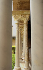 View on the rows of columns of the cloister of the Cathedral of Cefalu, Sicily, Italy