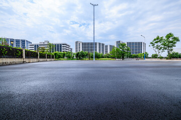Asphalt road square and factory building background