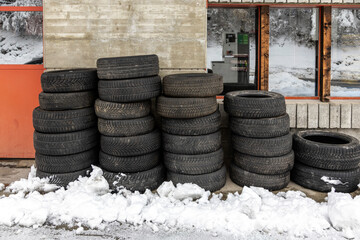 stack of old snow tires - 688072470