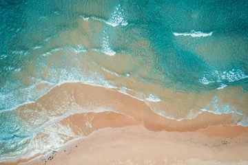 Fototapeten Aerial view to tropical sandy beach and blue ocean. Top view of ocean waves reaching shore on sunny day. Palawan, Philippines. © Евгений Бахчев