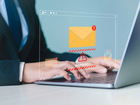 Businesswoman checking email on laptop shows new email notification notification screen Hacked passwords and personal information Cybercrime collection, error warnings