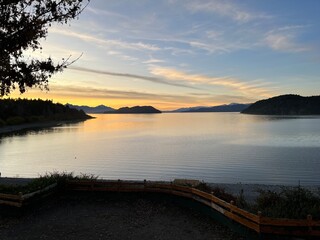 Sunset Symphony: Tranquil Colors on Nahuel Huapi Beyond Bariloche Center