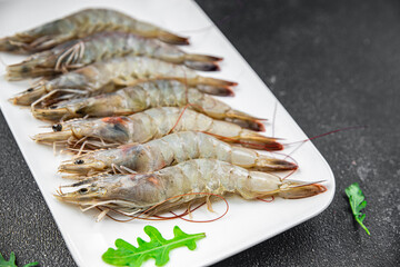 shrimp fresh langoustine raw prawn seafood fresh eating cooking appetizer meal food snack on the table copy space food background rustic top view 