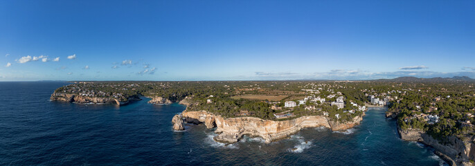 Cala Santanyi coast in Majorca panorama aerial view - obrazy, fototapety, plakaty