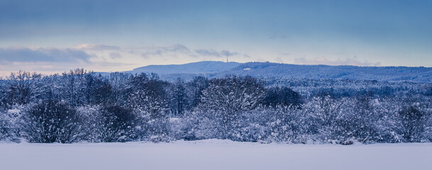Calm winter czech landscape with famous hill Klet