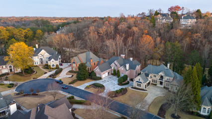 Aerial panoramic view of an upscale subdivision in suburbs of USA shot during golden hour in...