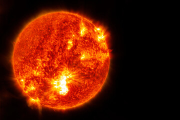 The sun on a dark background in space. Elements of this image furnished by NASA - obrazy, fototapety, plakaty