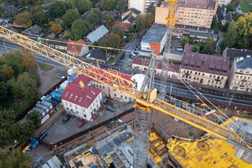 Drone photography of high rise building construction site in the middle of city