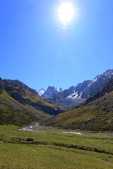 Ninth stage of Ak-Suu Traverse trek from Karakol Gorge to Jeti Oguz in Karakol national park,...