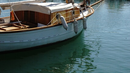 wooden boat moored in the port