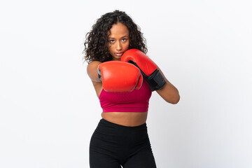Teenager cuban girl isolated on white background with boxing gloves