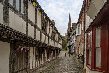 Cobbled street of Ledbury showing support with the colors of Ukraine