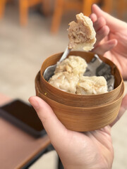 chicken shumai in bamboo basket