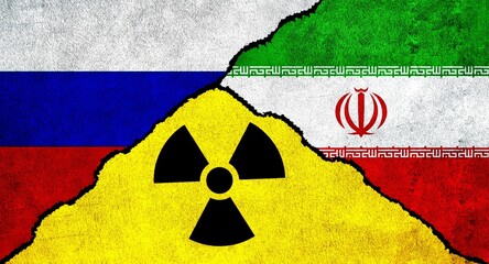 Flags of Russia, Iran and Nuclear symbol together on wall © Ruma
