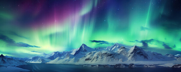 Fototapeta premium Majestic aurora borealis illuminating a mountain range