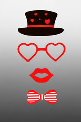 Love heart abstract design for Valentines Day with luscious lips, glasses, bow tie and black hat. Surreal decorative Valentine concept on gradient gray white.