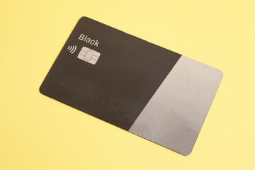Bank Credit Card On Yellow Background.