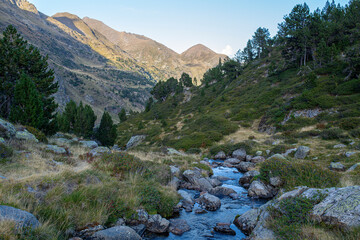 Fototapeta na wymiar You can go down from the Tristaina ponds following the course of the river in Andorra