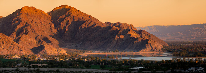 Dramatic sunrise over La Quinta desert mountains  - Powered by Adobe