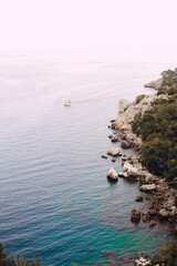 Floating boat nearby the seashore