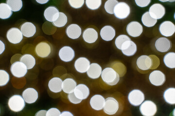 Festive Blurs: New Year and Christmas Lights Create a Magical, Whimsical Ambiance.