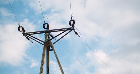 Energy pole against beautiful cloudscape