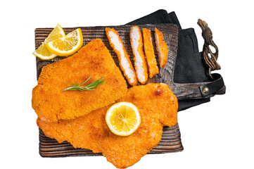 Fried sliced weiner schnitzel on a wooden board with herbs.  Transparent background. Isolated.