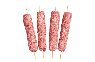 Raw kofta or lula kebabs skewers on butcher board. Transparent background. Isolated.