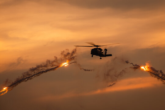 Indian Navy Helicopter deploying IRCM flares