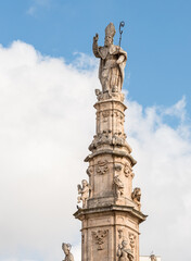 View of column of Saint Oronzo located in Liberty square in Ostuni, province of Brindasi, Puglia, Italy