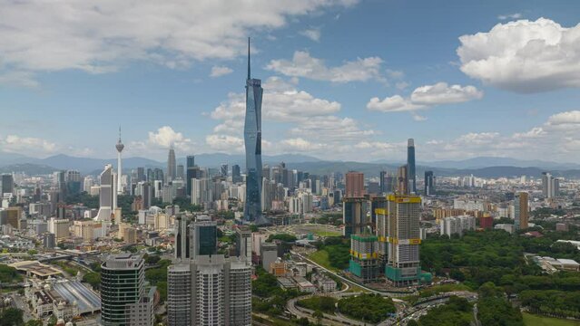 sunny day kuala lumpur cityscape famous towers aerial panorama 4k timelapse malaysia 