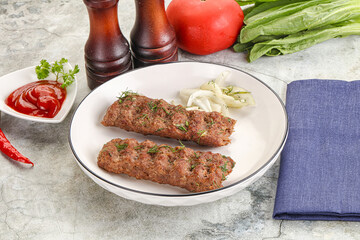 Kebab with beef served onion