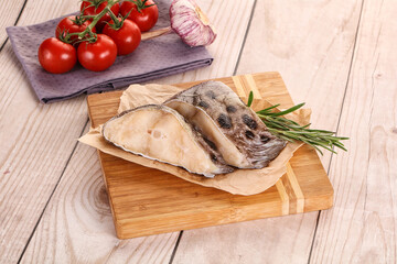 Raw wolffish steak for cooking