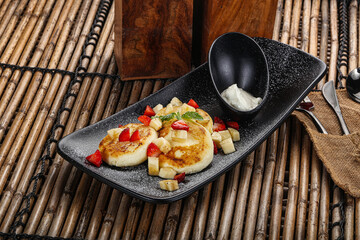 Russian cuisine curd pancake Syrniki