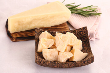 Chopped Italian hard parmesan cheese