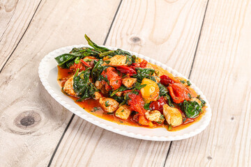 Chicken with tomato and spinach