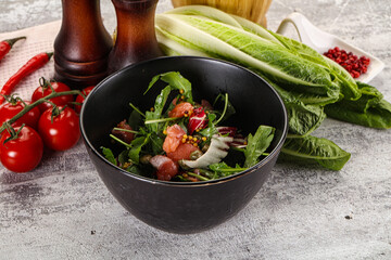 Salad with salmon and arugula