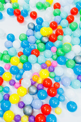 Plastic multi-colored balls for children's games. Balls for a dry pool.