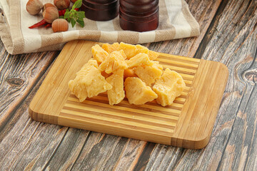 Crushed hard parmesan cheese pieces