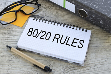 80 20 Rule gray folder and glasses on stickers. text on paper