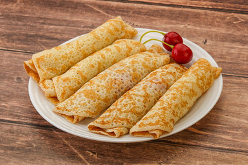 Sweet and tasty pancake with cherry