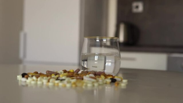 a lot of tablets and water