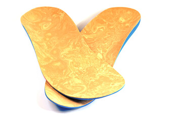  Orthopädische Schuheinlagen vor weißem Hintergrund