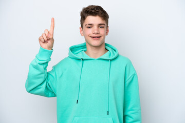 Teenager Russian man isolated on white background pointing up a great idea