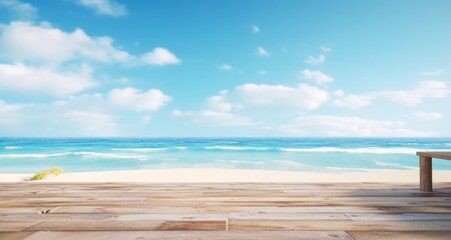 Fototapeta premium wooden table at the beach overlooking the ocean with blue sky