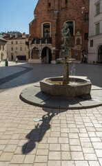 Fountain on Mariacki square in Krakow, Poland - 688193062