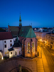 Picturesque old town Franciszkanska street and St Francis church during blue hour, Krakow, Poland