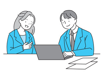 相談しながら仕事するスーツの男女